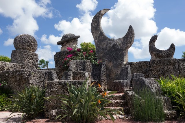 Who Built Coral Castle and What Motivated Their Dream?